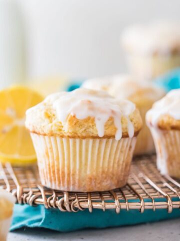 close-up view of a muffin drizzled with lemon glaze
