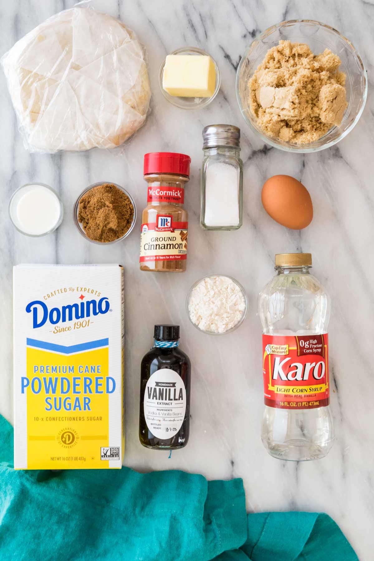 overhead view of ingredients including brown sugar, corn syrup, cinnamon, and more