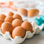photo showing how to bring cold eggs to room temperature using a bowl of warm water