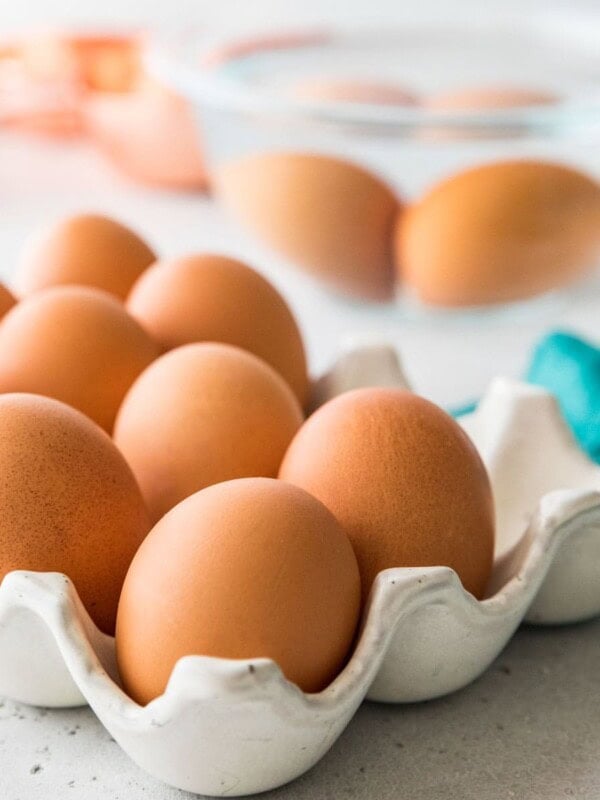 photo showing how to bring cold eggs to room temperature using a bowl of warm water