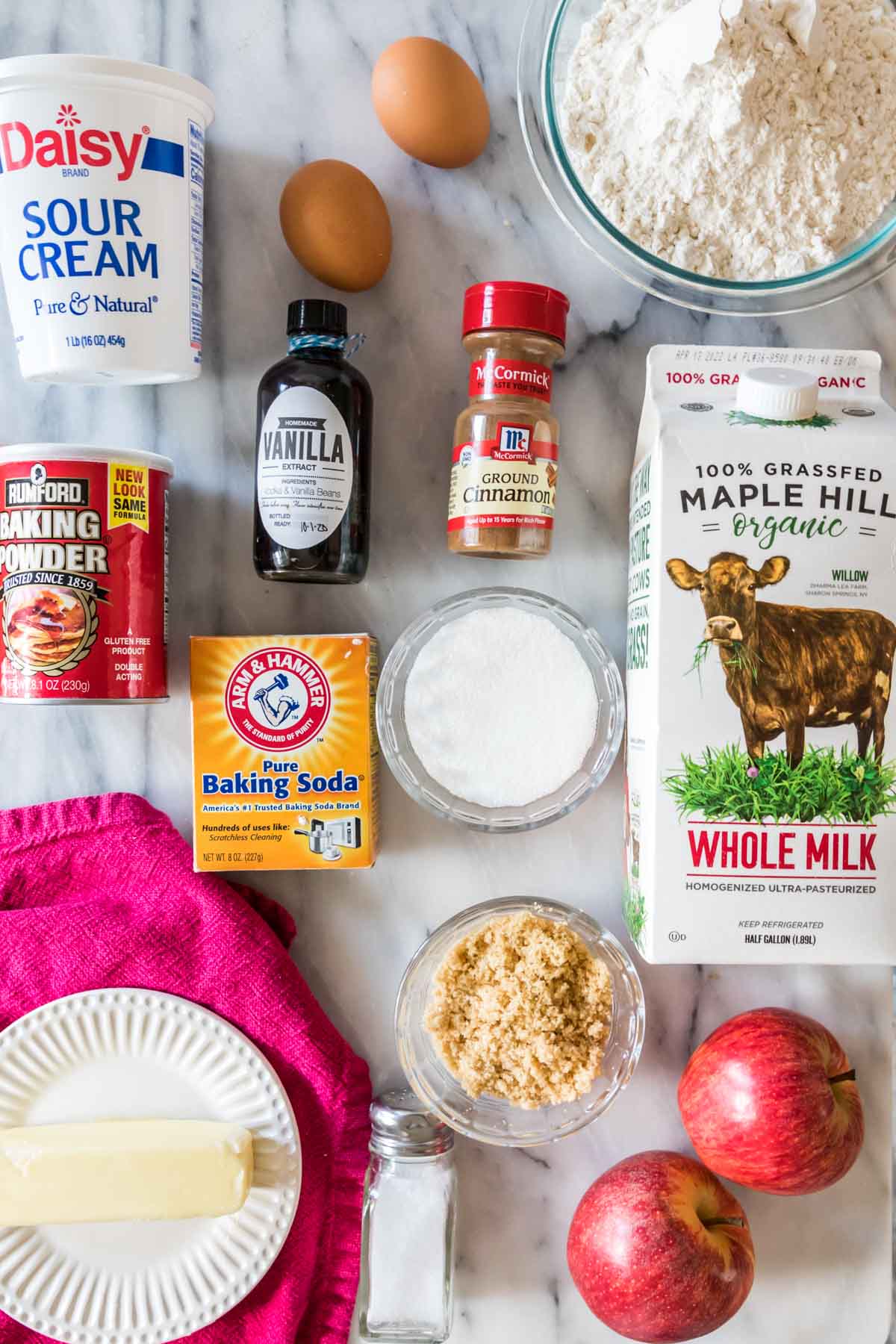 overhead view of ingredients including milk, apples, sour cream, and more