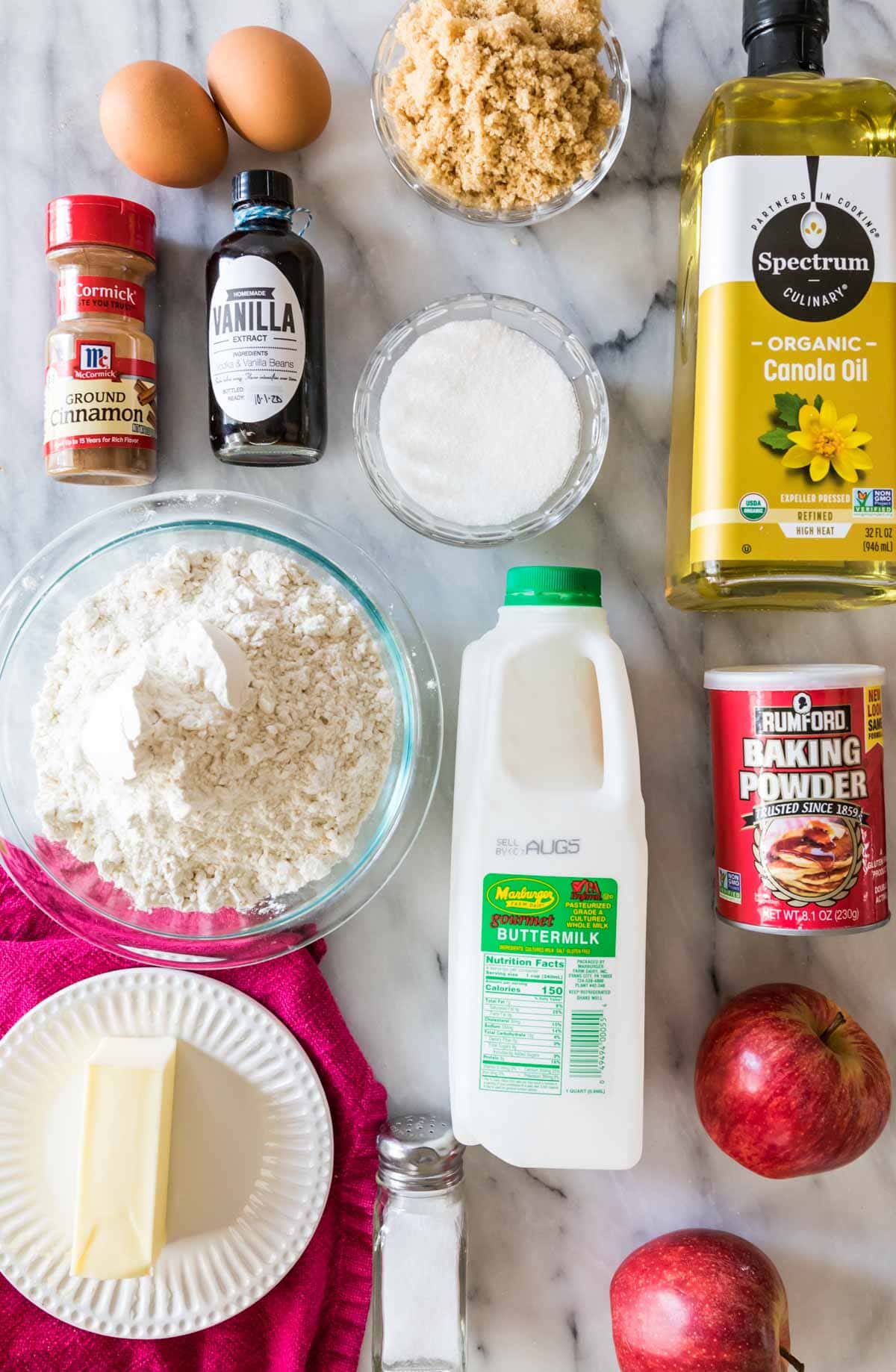 overhead view of ingredients including eggs, buttermilk, apples, and more