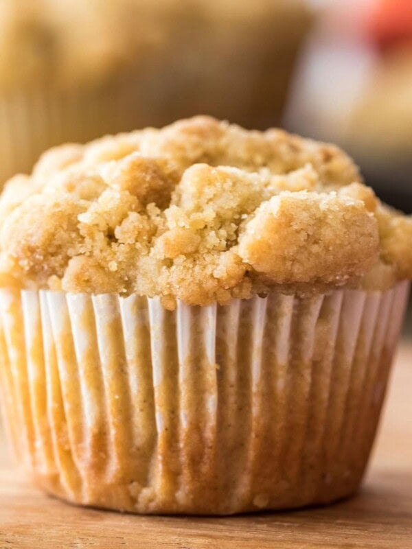 close-up shot of an apple muffin topped with streusel