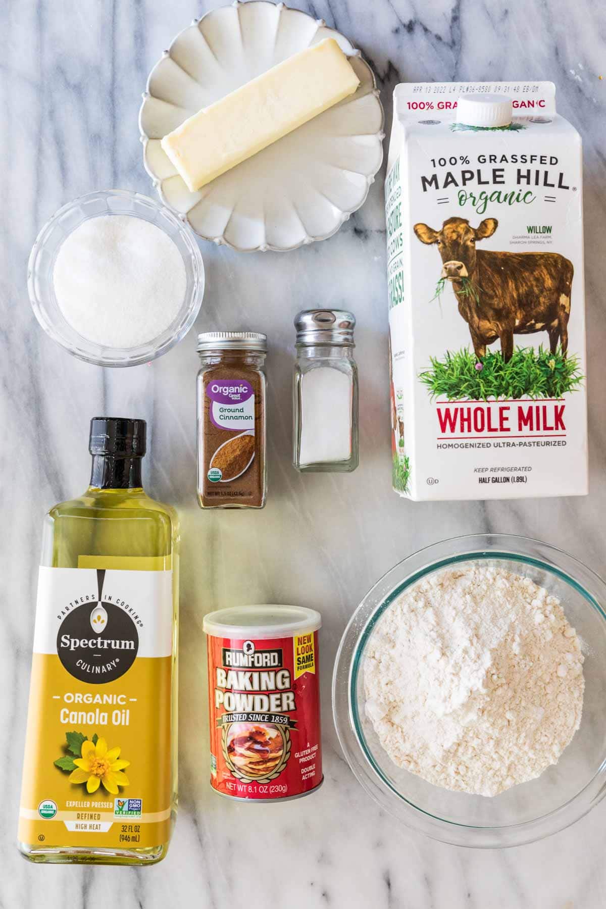 overhead view of ingredients including butter, milk, flour, sugar, and more