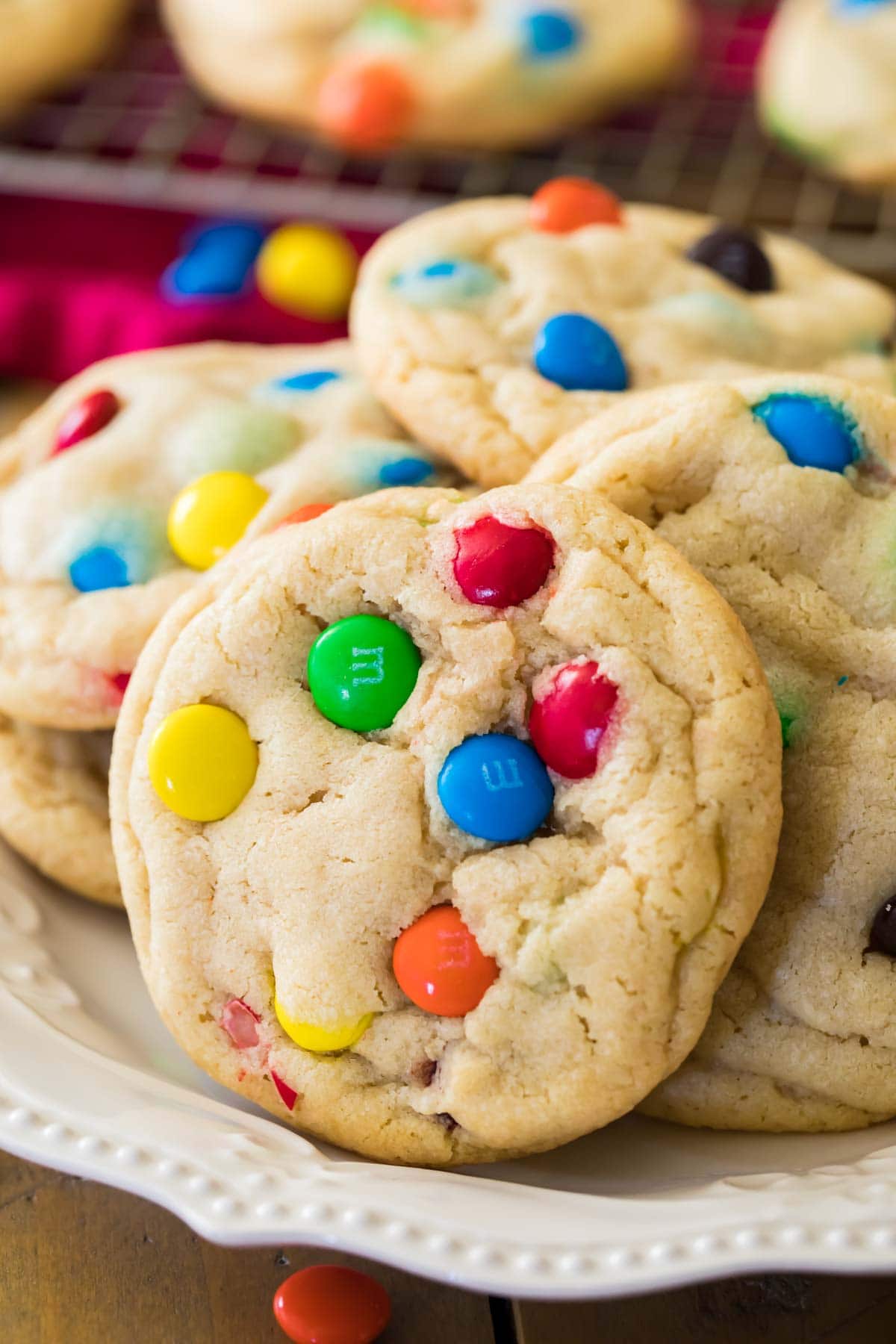 cookies studded with m&m candies laying against each other