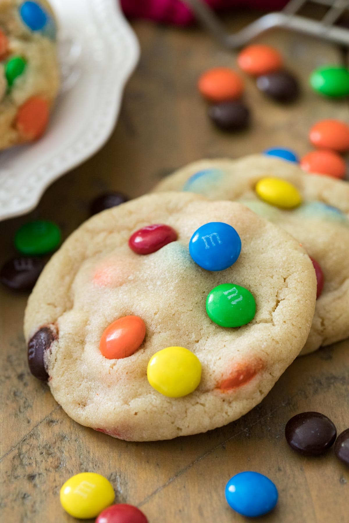 cookies studded with m&m candies laying against each other