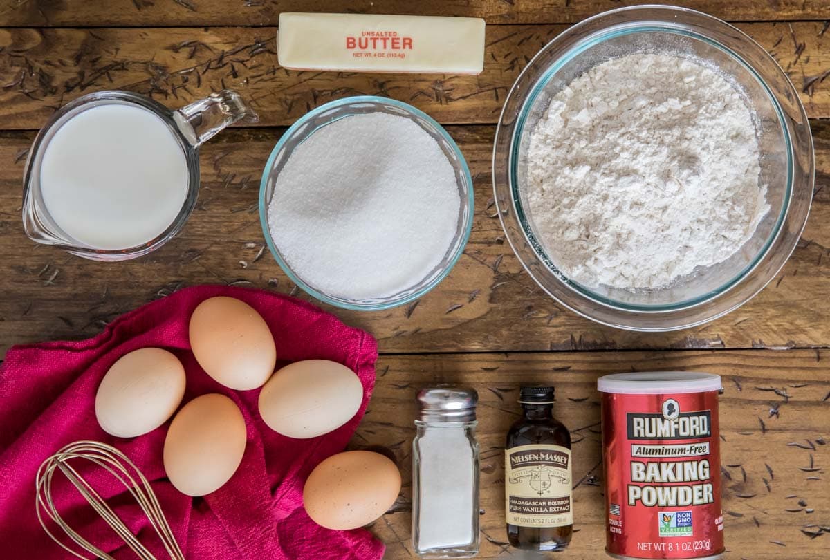 overhead view of ingredients including eggs, flour, sugar, butter, and more
