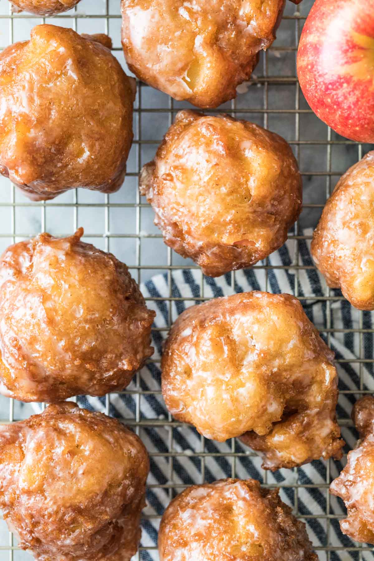 overhead view of fritters on a cooling rack after frying