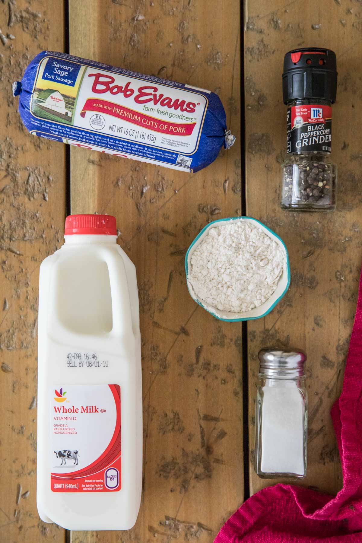 Ingredients for sawmill gravy (flour, sausage, salt, pepper, milk)