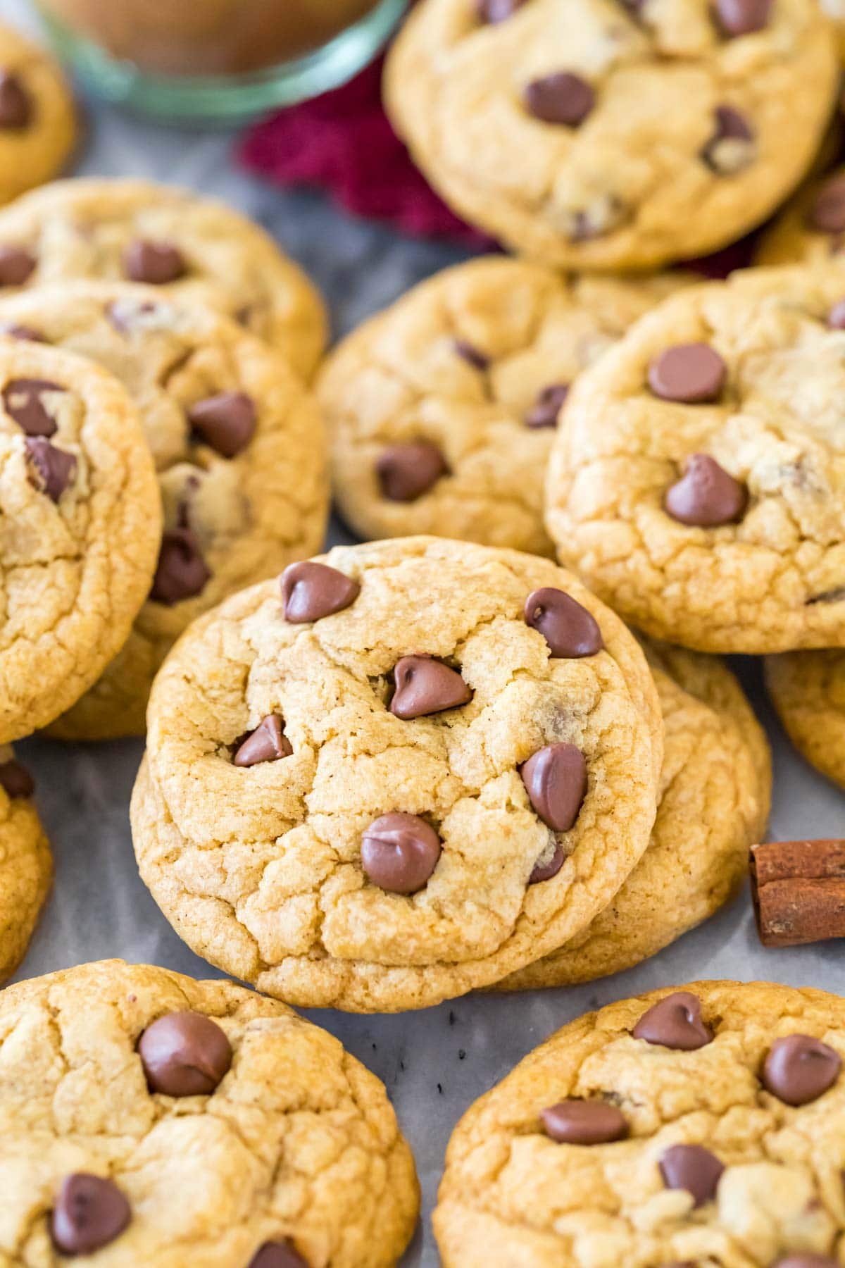 Pile of pumpkin chocolate chip cookies.