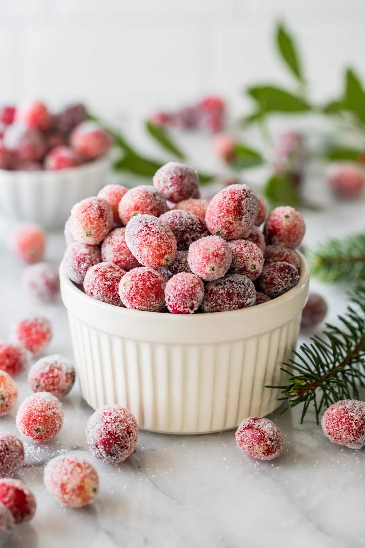 Ramekin of sugared cranberries.