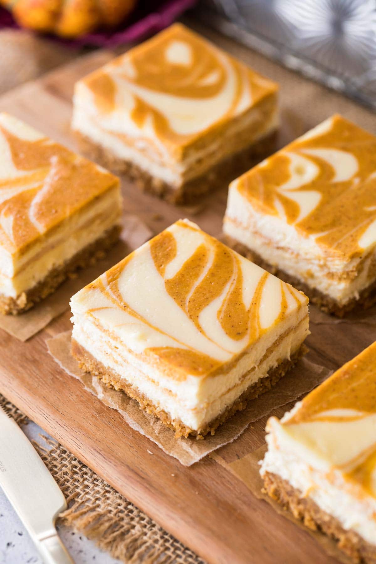 Overhead view of swirled cheesecake bars just after being cut.