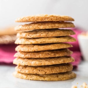 Butter crunch cookies stacked to show how thin and crisp they are.