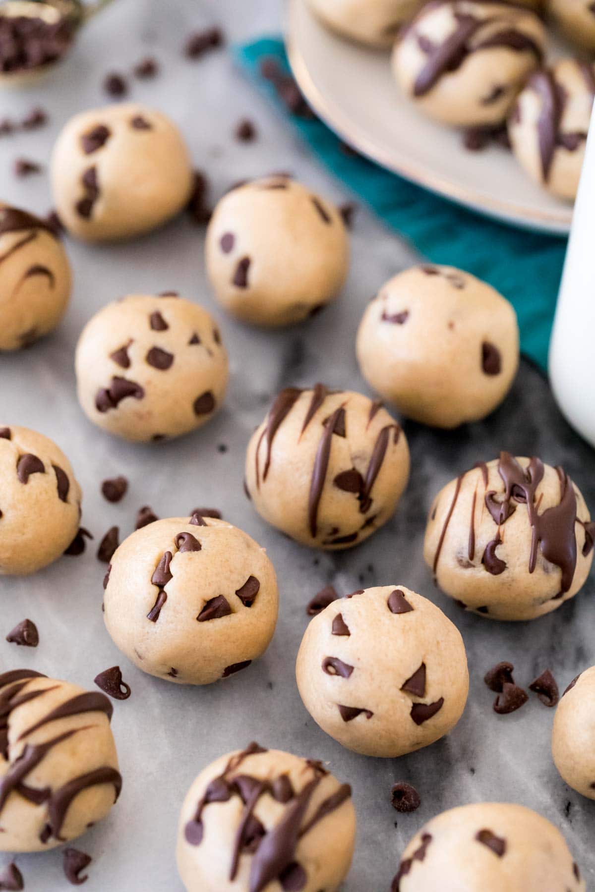 Overhead view of cookie dough that's been rolled into balls.