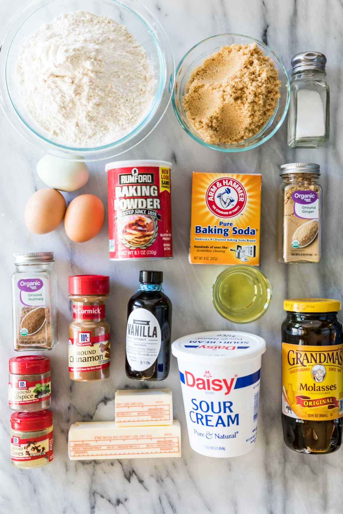 Overhead view of ingredients including brown sugar, molasses, ginger, and more.