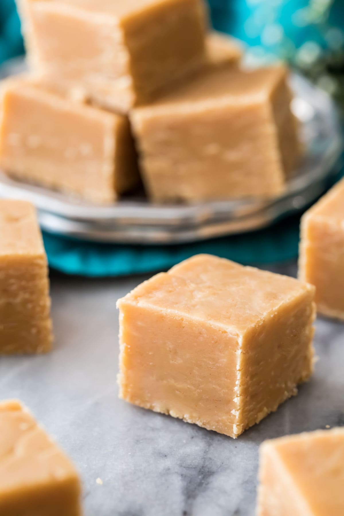 Precisely cut cubes of homemade peanut butter fudge.