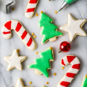 Overhead view of Christmas cookies frosted with an easy sugar cookie icing recipe.