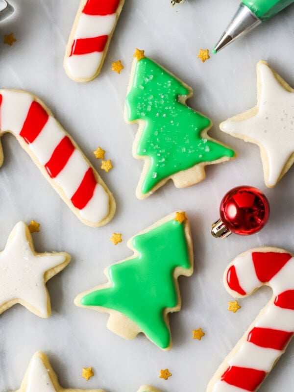 Overhead view of Christmas cookies frosted with an easy sugar cookie icing recipe.