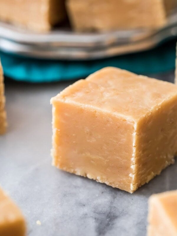 Precisely cut cubes of homemade peanut butter fudge.