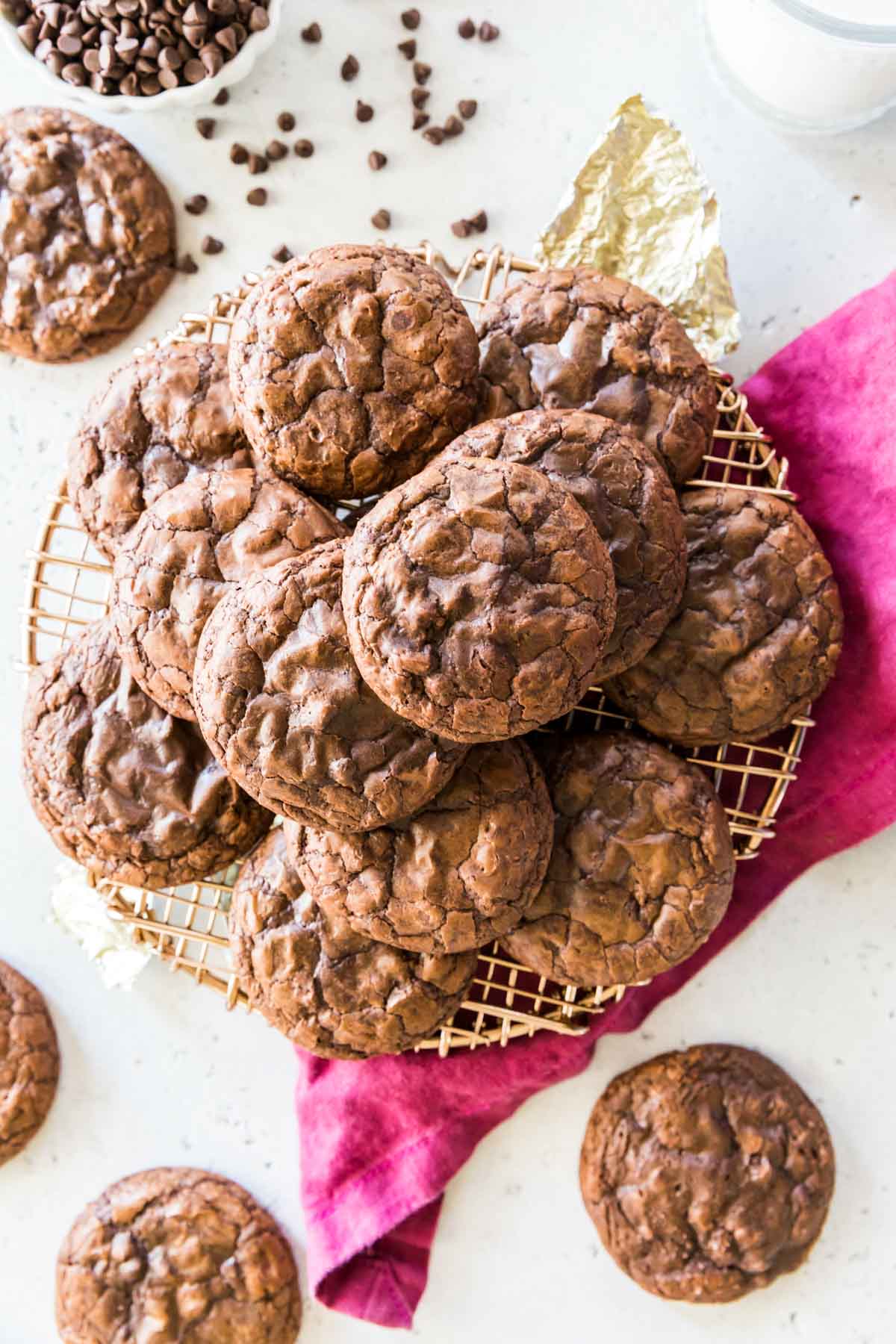 Overhead view of chocolate cookies on a cooling rack.