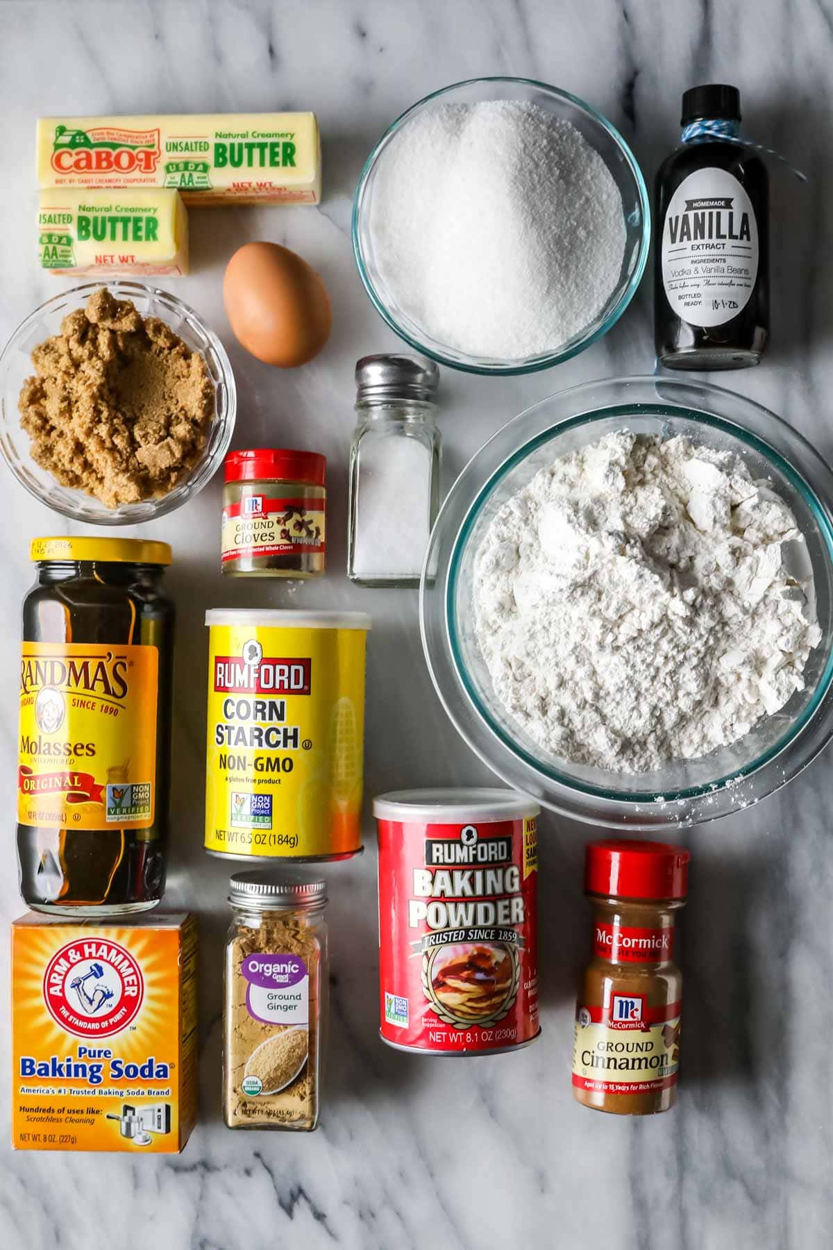 Overhead view of ingredients including molasses, brown sugar, butter, and more.