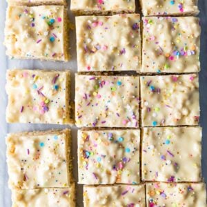 Overhead view of cake batter rice krispie treats after cutting into squares.