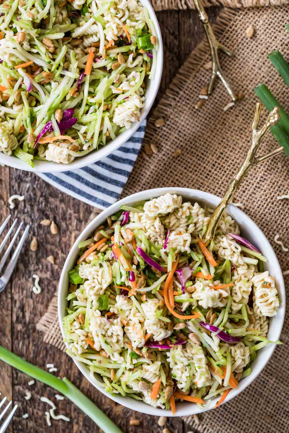 Overhead view of two bowls of an asian-inspired noodle salad.