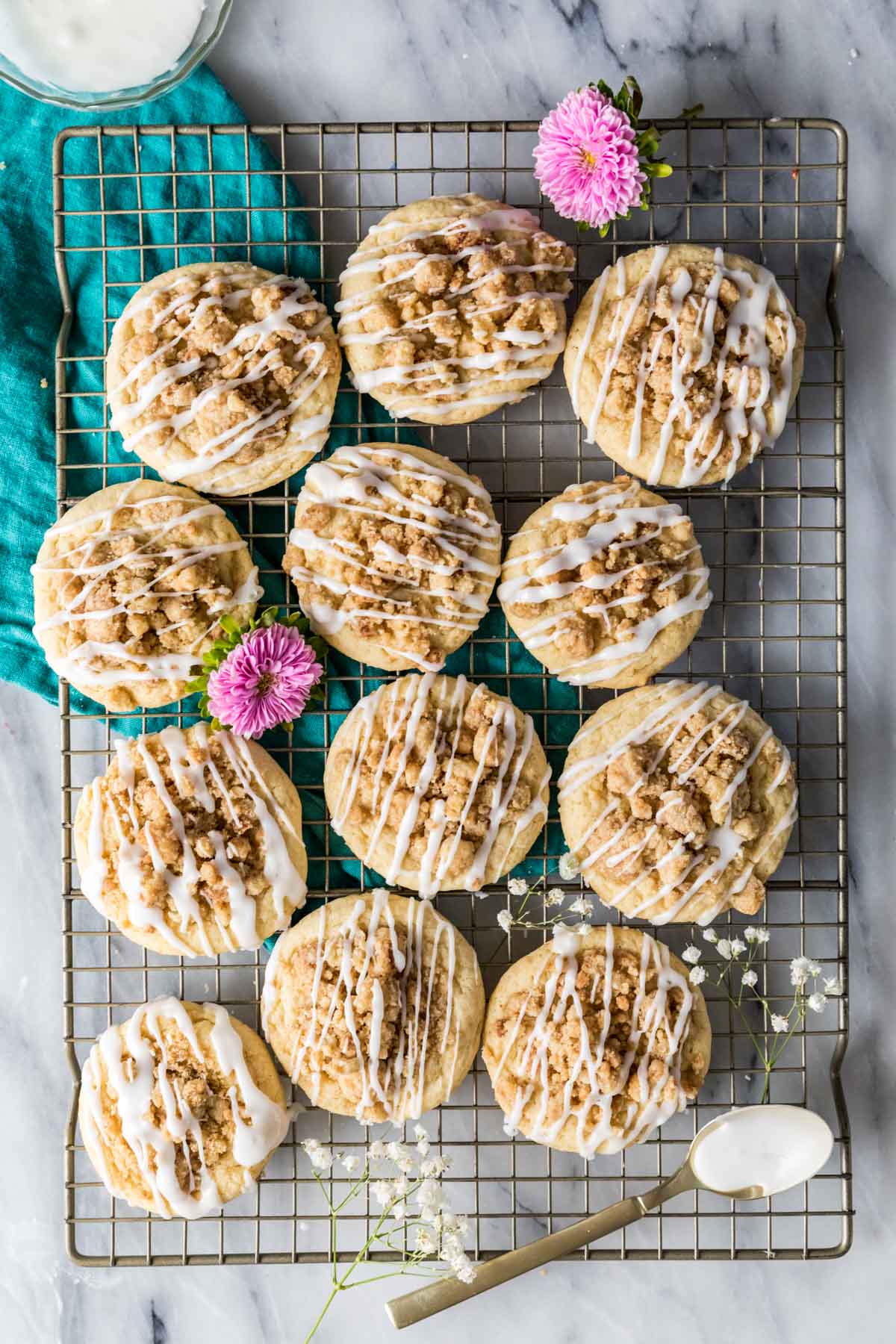 Overhead view of a cooling rack with coffee cake cookies on top.