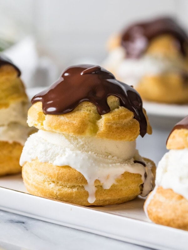 Ice cream filled profiteroles topped with chocolate ganache.