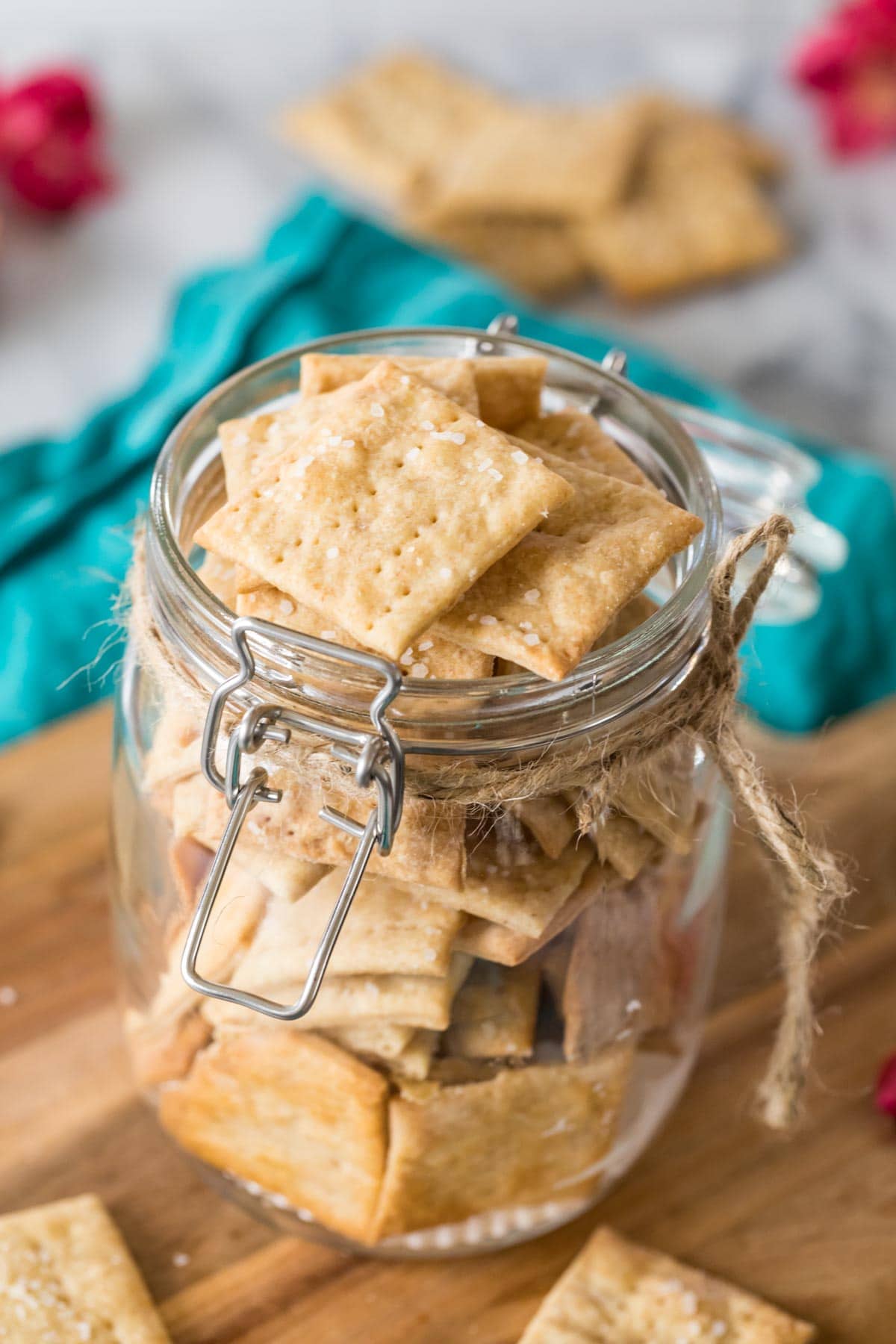 Jar filled with crackers made with sourdough discard.