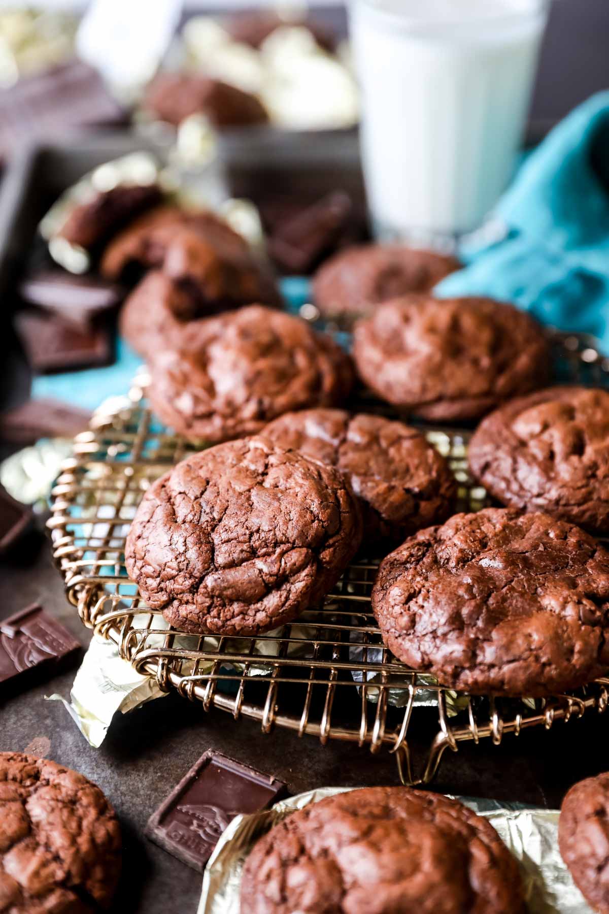 Chocolate cookies on a cooling rack.