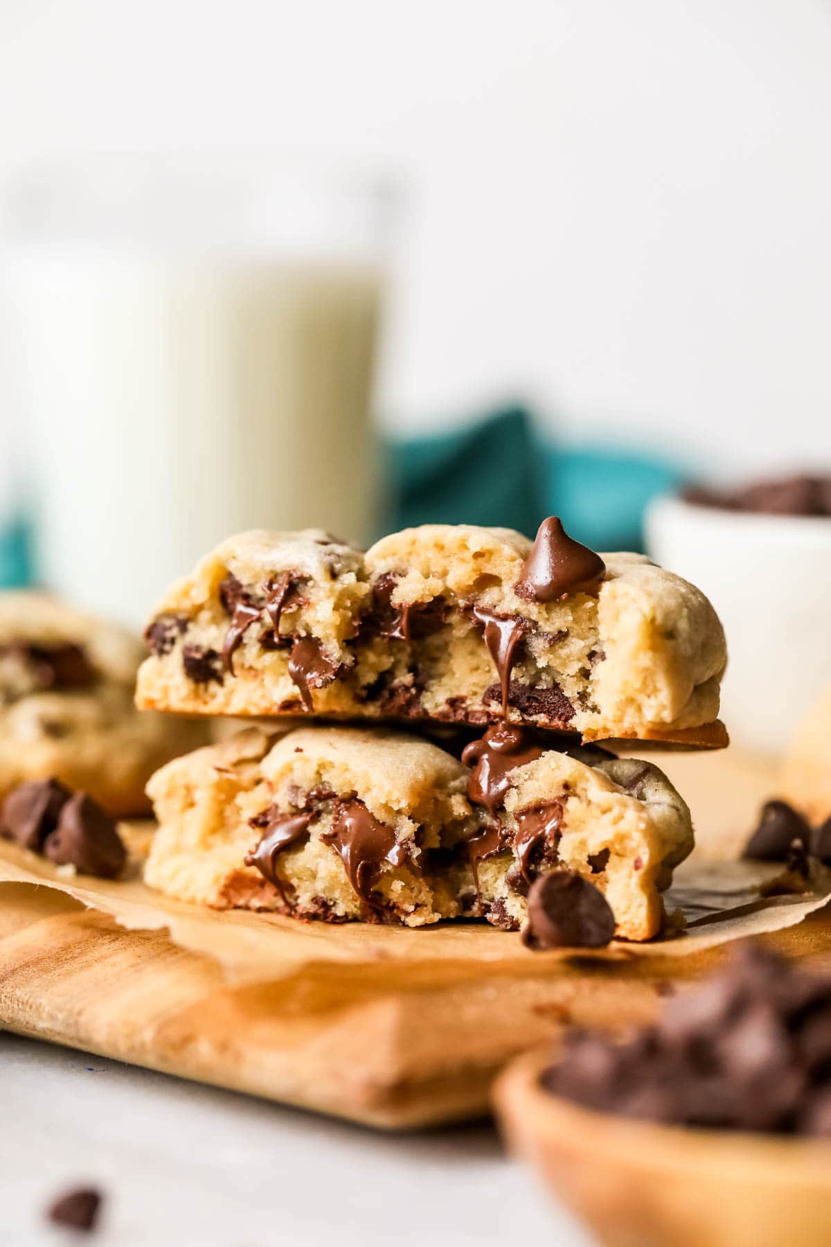 Chocolate chip cookie that's been broken in half and stacked.