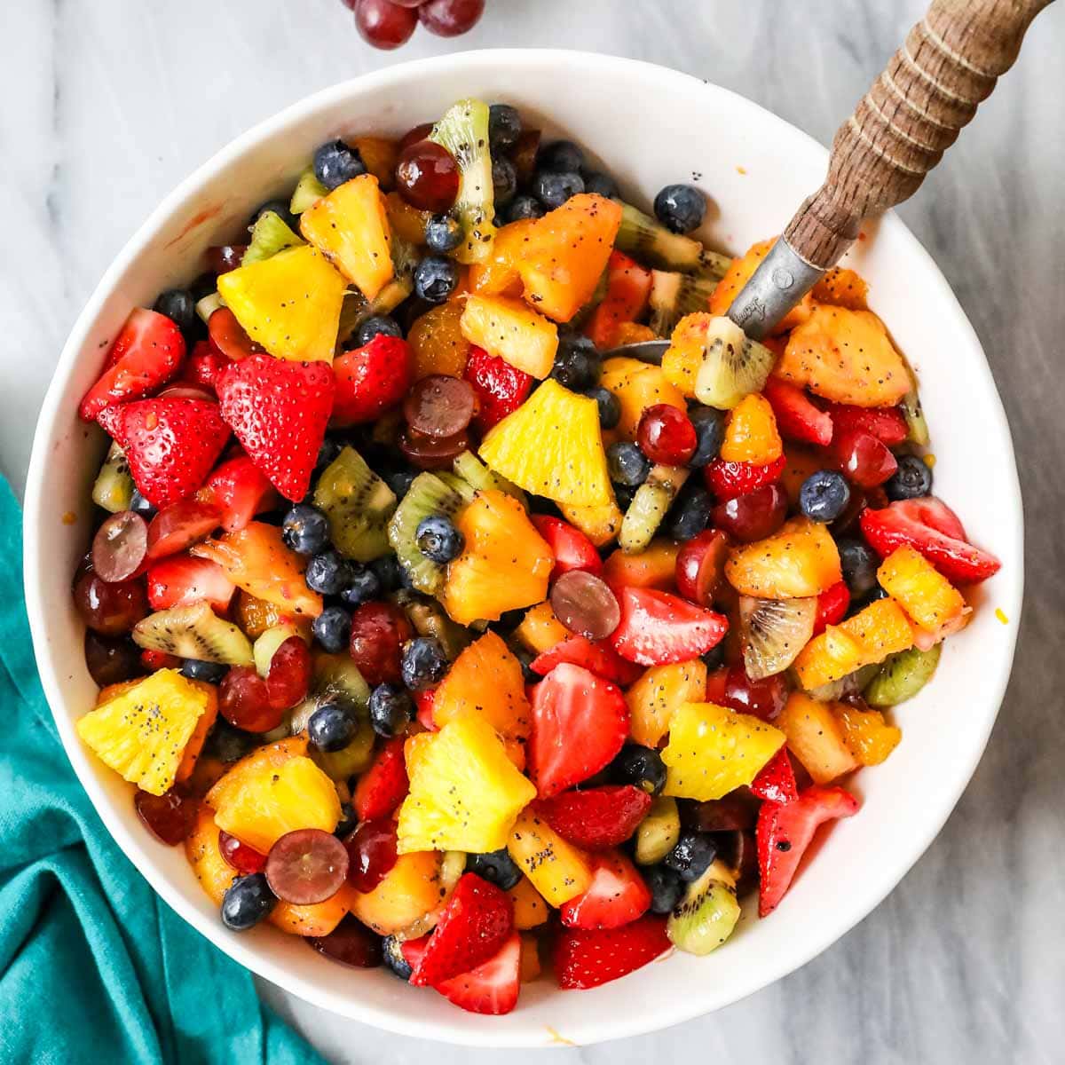 https://sugarspunrun.com/wp-content/uploads/2023/08/Fruit-Salad-Recipe-1-of-1.jpg