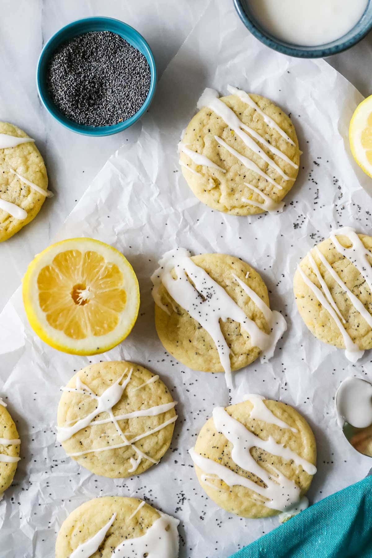 Overhead view of lemon poppy seed cookies drizzled with lemon glaze.