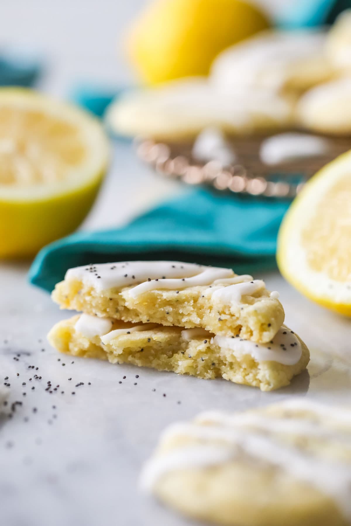 Two halves of a lemon cookie stacked on top of each other.
