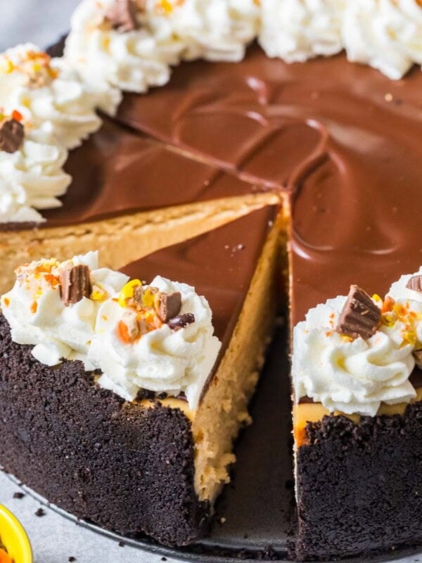 Slice of peanut butter cheesecake that's just been cut.