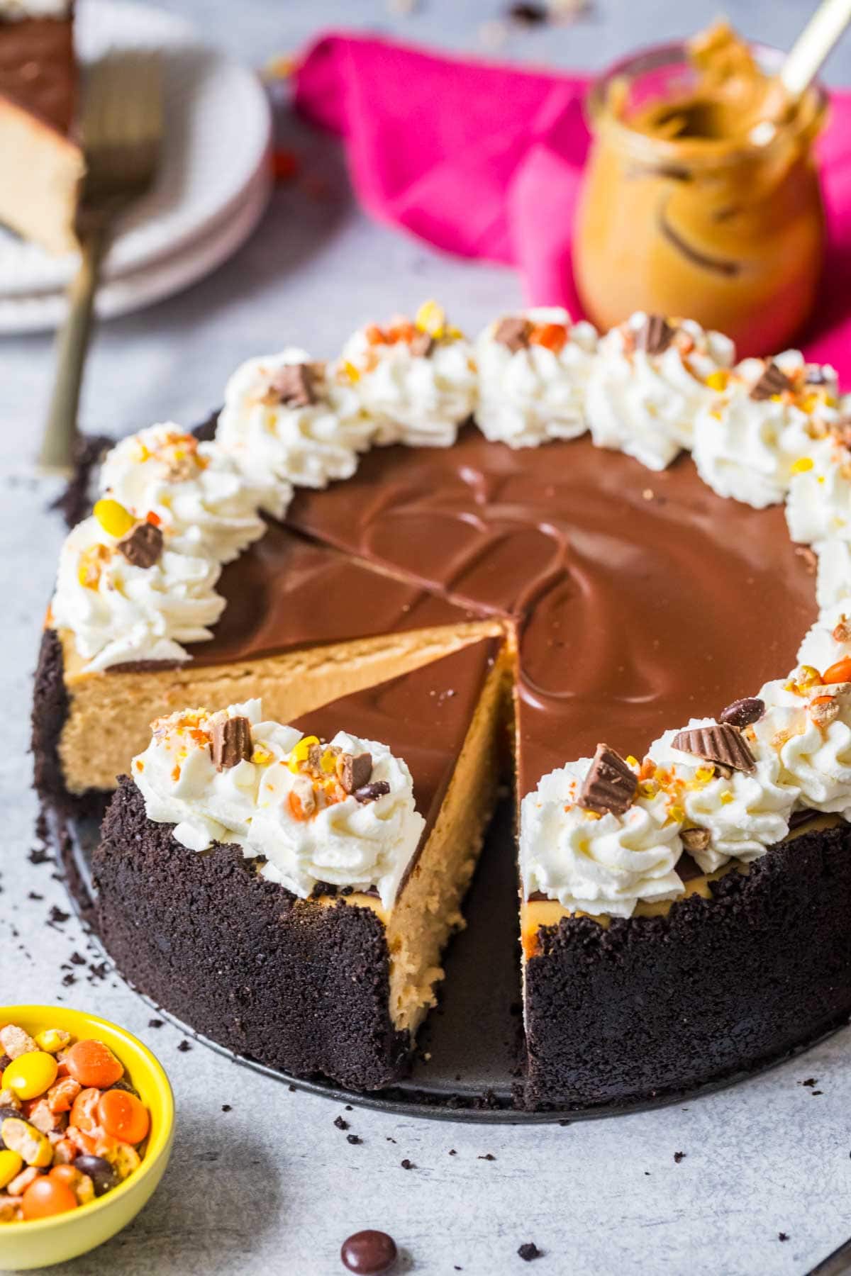 Slice of peanut butter cheesecake that's just been cut.