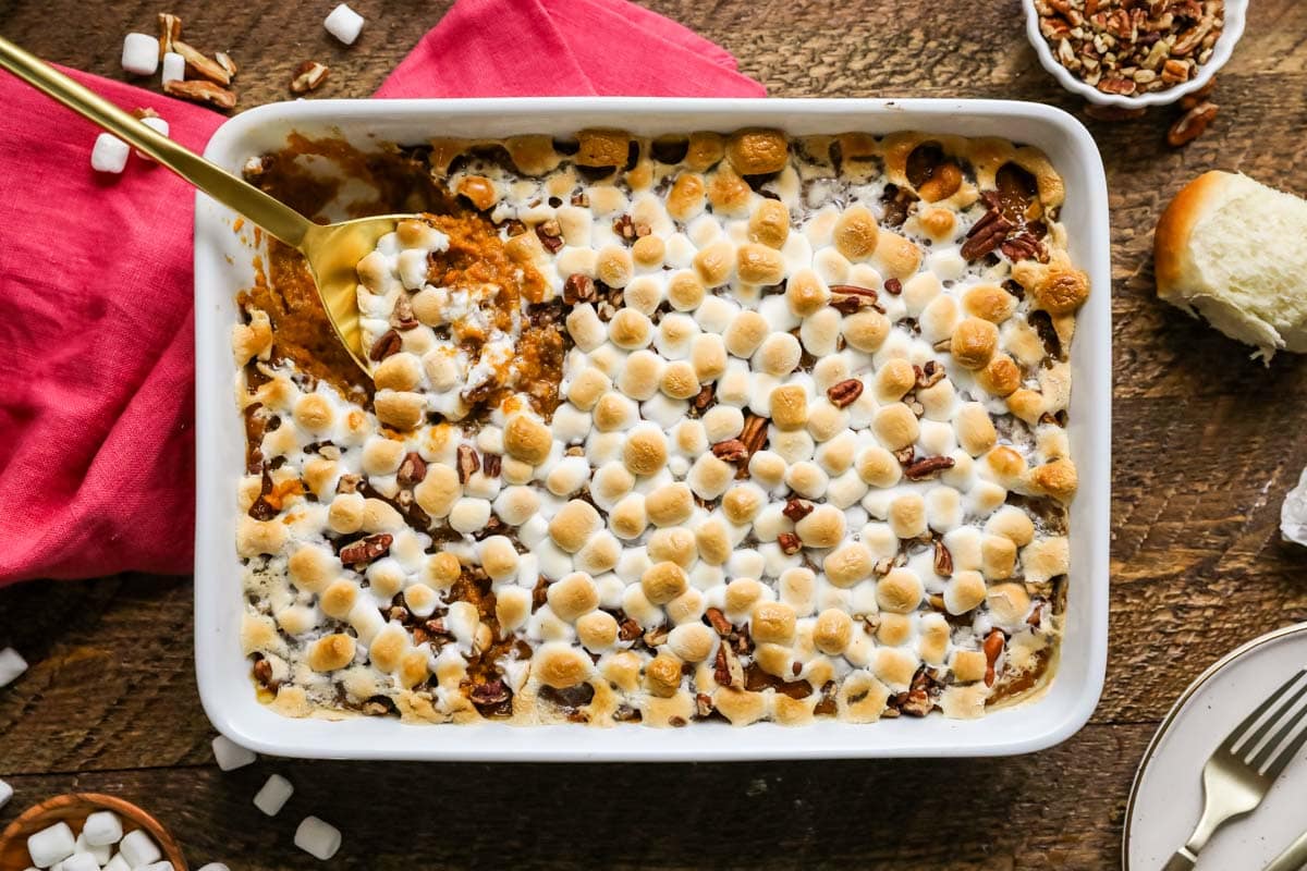 Overhead view of a casserole topped with toasted mini marshmallows.