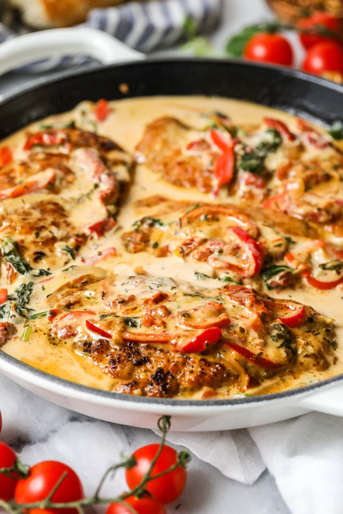 Tuscan chicken in a cast iron skillet.