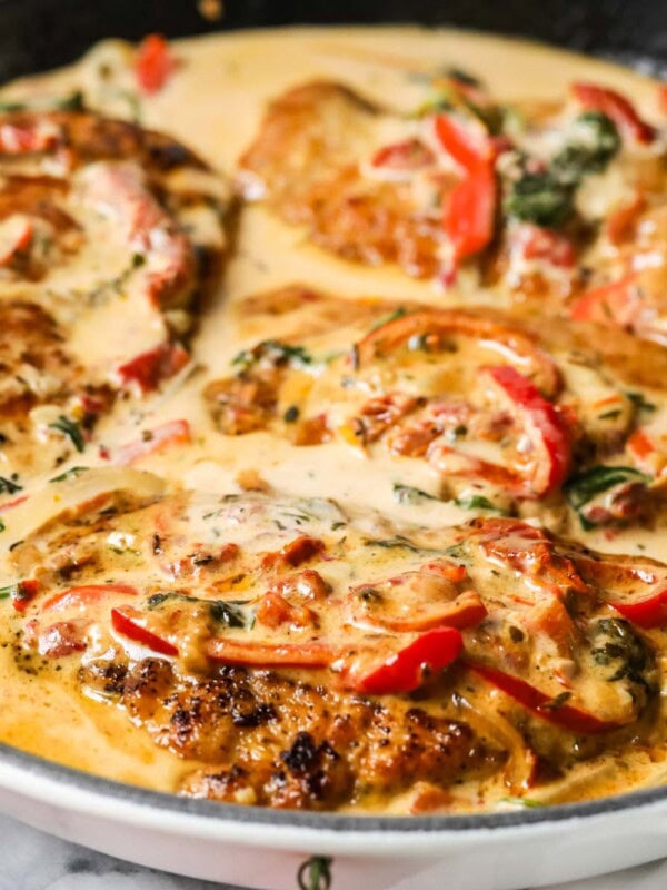 Tuscan chicken in a cast iron skillet.