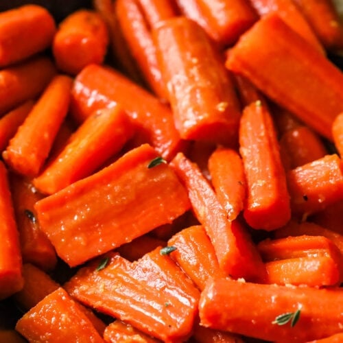 Close-up view of maple glazed carrots.