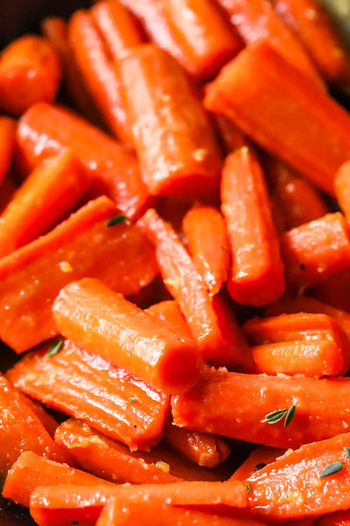 Close-up view of maple glazed carrots.