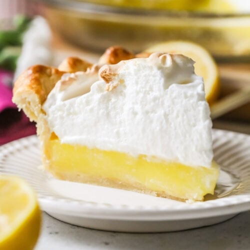 slice of lemon meringue pie on plate