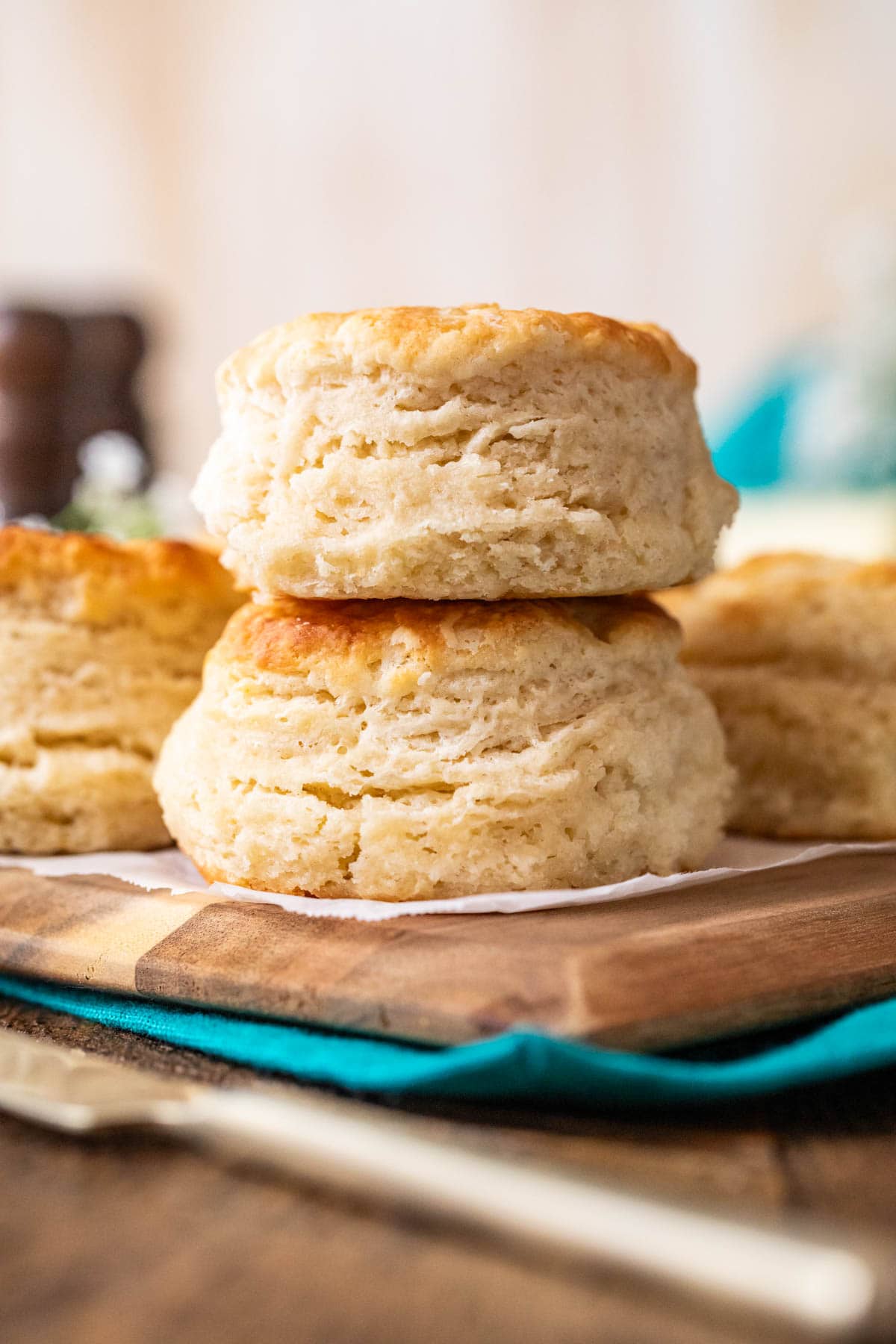Two fluffy, layered biscuits stacked on top of each other.