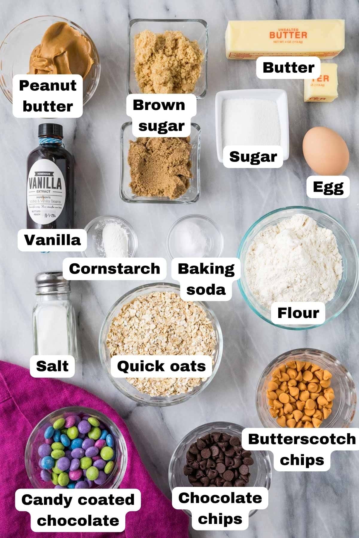 Overhead view of labelled ingredients including brown sugar, oats, peanut butter, and more.