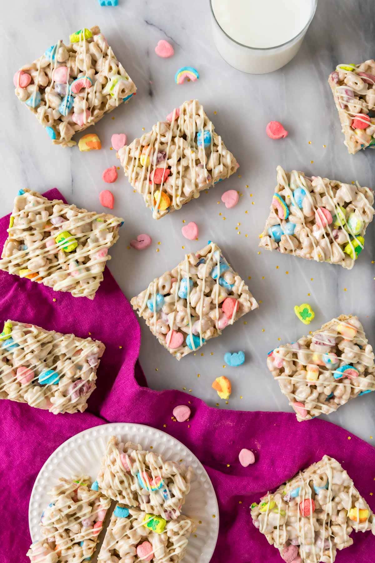 Overhead view of marshmallow cereal bars made with Lucky Charms cereal.