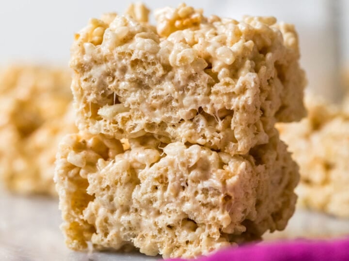 Two brown butter rice krispie treats stacked on top of each other.