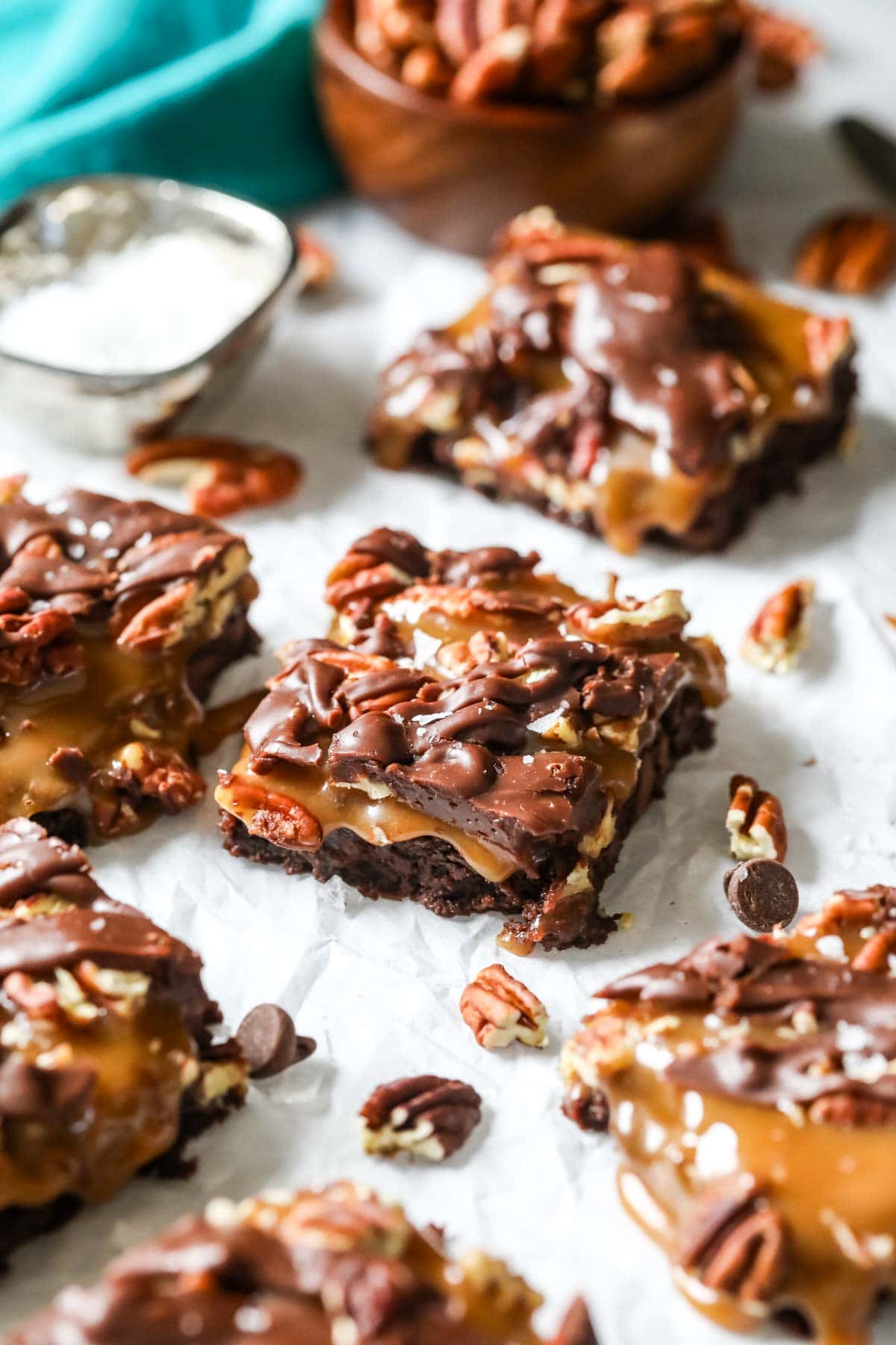 Turtle brownies made with homemade caramel, pecans, a chocolate drizzle, and sea salt.