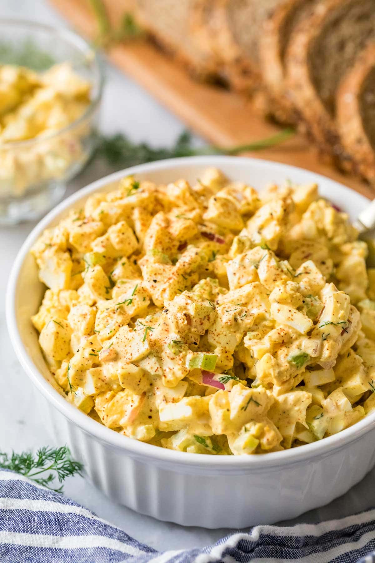 Egg salad in a white serving dish.