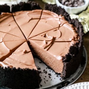 No-bake chocolate cheesecake that's been cut into slices.